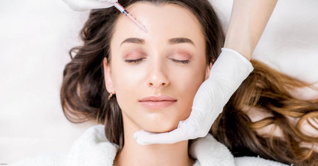 A woman receives BOTOX® Cosmetic Injections.